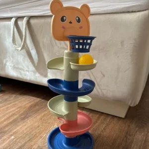 Ricevuto giocattolo rotante Montessori con pista e palline dal cliente D****n.